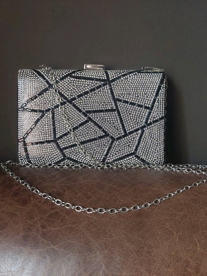 Shiny black crossbody bag with silver chain like new