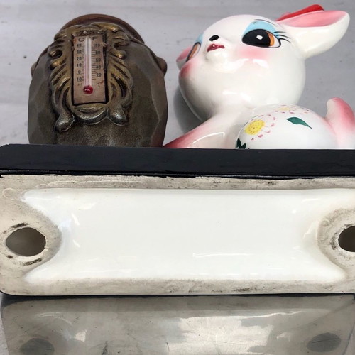 Ceramic decorative vase with thermometer used