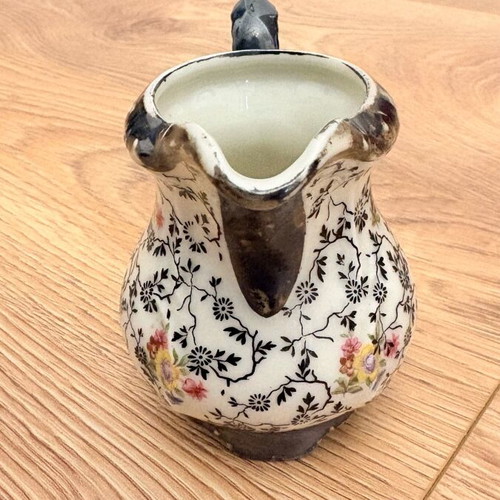 Small vintage Bavaria porcelain jug used with silver decoration
