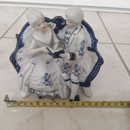 Vintage couple figurine reading on sofa rococo style like new