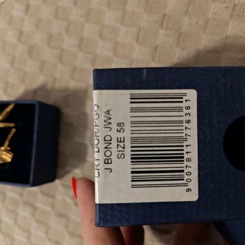 Swarovski James Bond ring set No 58 like new, gold color