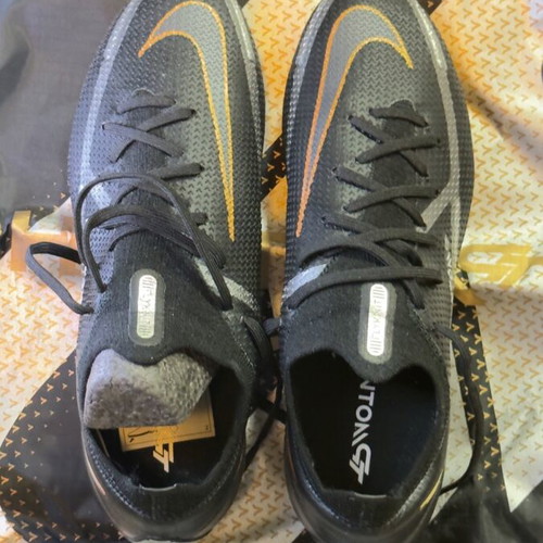 Nike football shoes new, size 38.5, black and gold