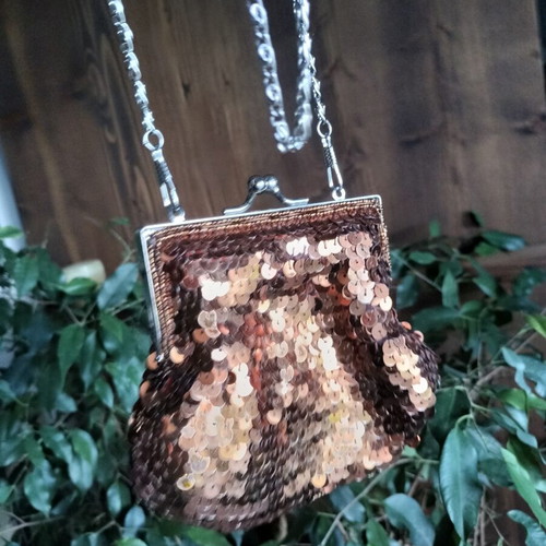 Small shoulder bag with copper sequins and long chain