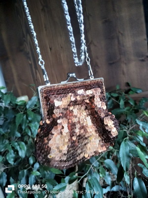 Small shoulder bag with copper sequins and long chain