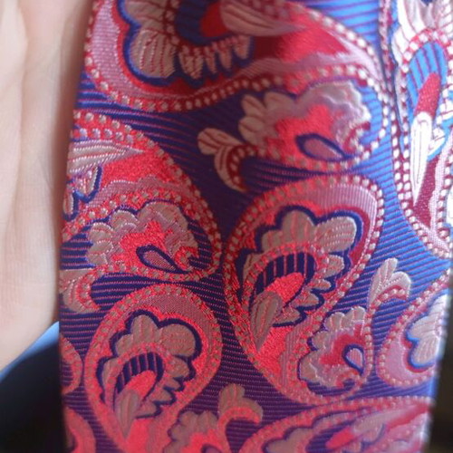 Silk tie new with unique paisley pattern, burgundy and blue