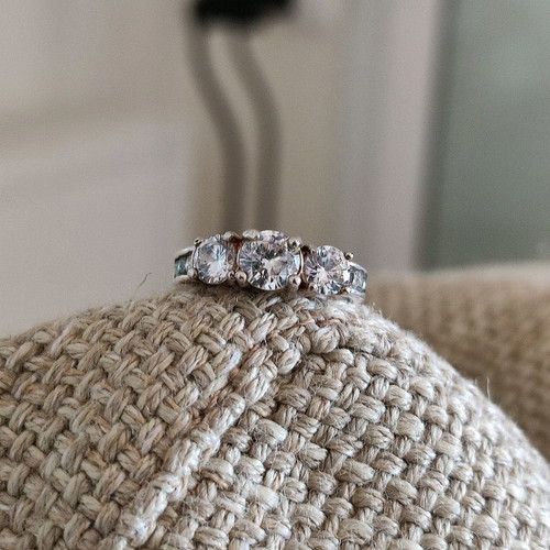 Trilogy silver plated ring used with zircon and heart motifs