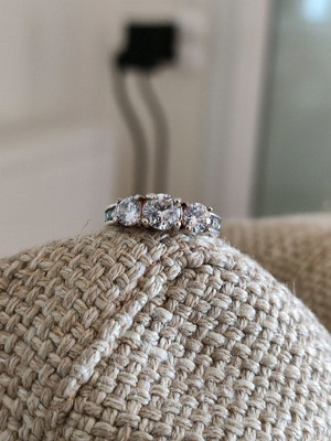 Trilogy silver plated ring used with zircon and heart motifs