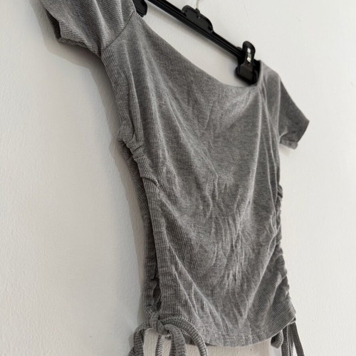Women's gray blouse with short sleeves and drawstrings used, size S