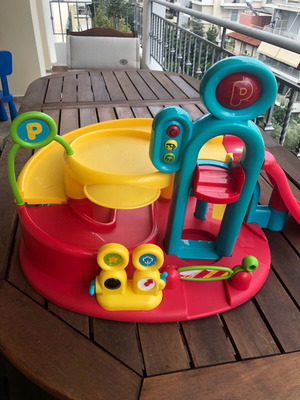 Toy car parking garage with washer used