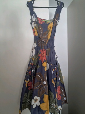 Dress used, colorful with pockets, sizes M and L