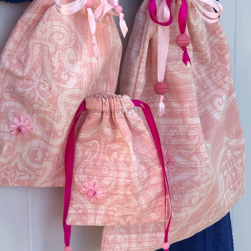 Set of three handmade pink pouches new, cotton with wooden beads