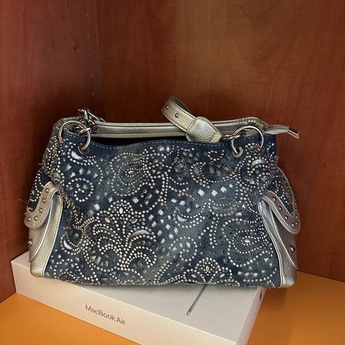 Shoulder bag silver, like new, bought abroad
