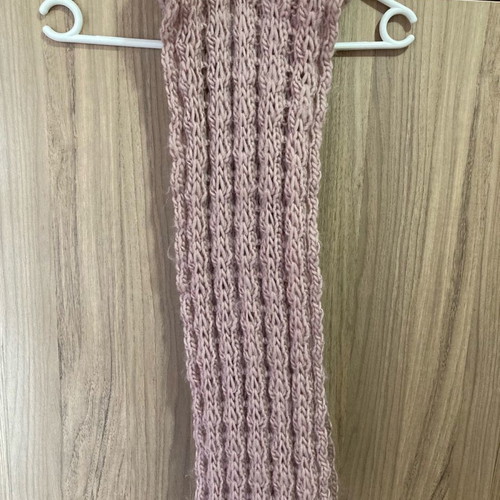 Women's knitted pink neck scarf used