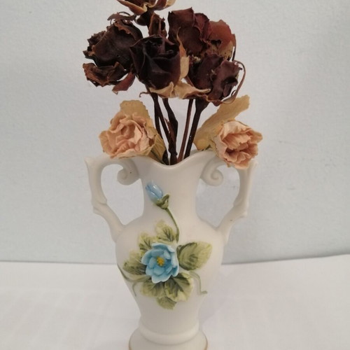 Porcelain vase with dried roses like new, 1986 vintage