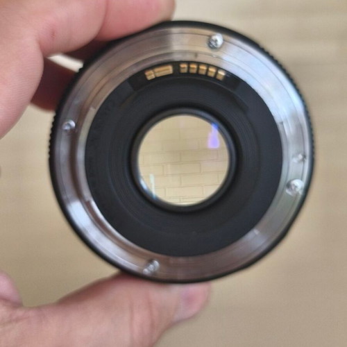Canon EF 50mm f/1.8 STM lens with hood