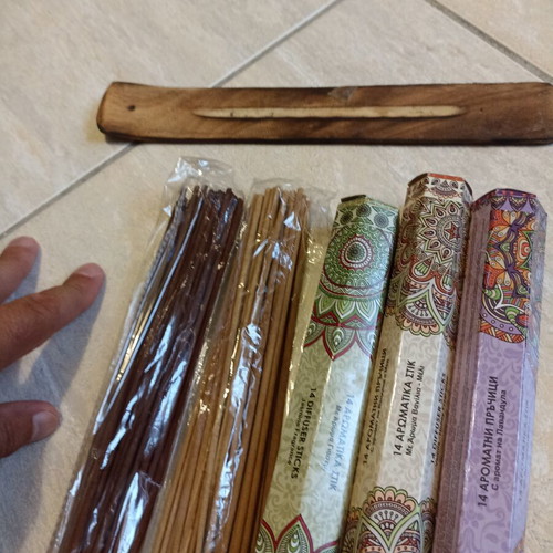 Aromatic incense sticks with wooden base, assorted scents