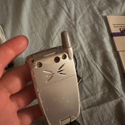 Panasonic EB-GD87 mobile phone used with box and charger needing repair
