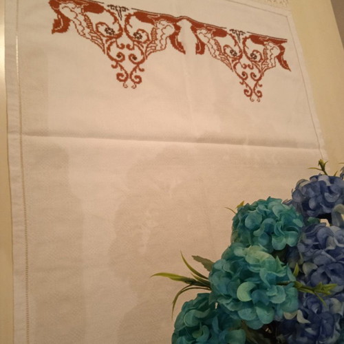 Handmade white embroidered table runner tzevres in terracotta-brown shades