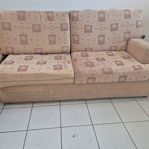 Corner sofa used, beige fabric, sturdy construction