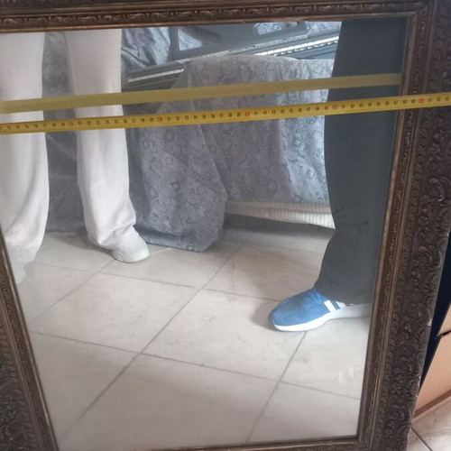 Mirror with wooden gold carved frame used, with damages