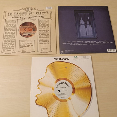Collection of 4 vinyl records like new