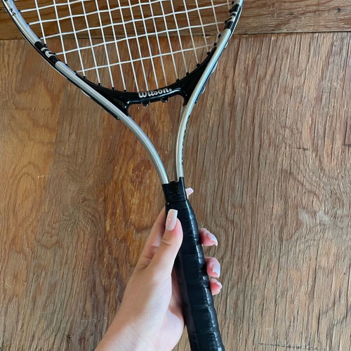 Wilson tennis racket used with minor wear