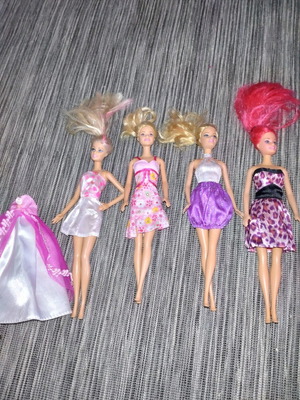 Barbie Ariel and three more Barbies used, pack of 4 with dress gift