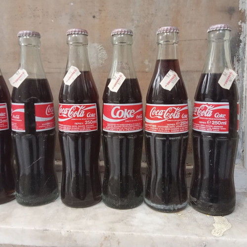 Collectible Coca Cola bottle full from 1990s decade new, one piece