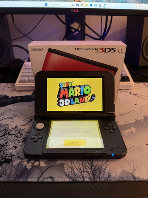 Nintendo 3DS XL червено и черно като нов с кутия и аксесоари