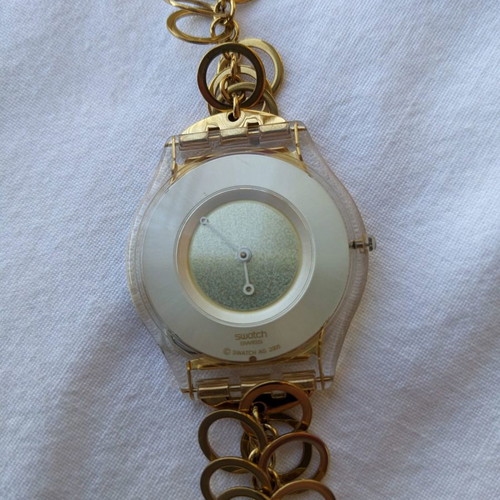 Swatch women's watch used with gold chain strap