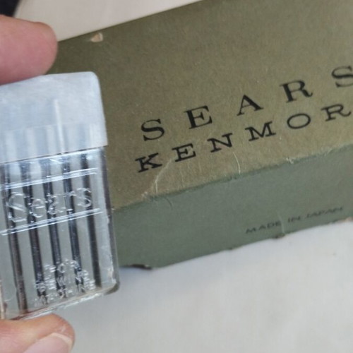 Sears Kenmore sewing machine consumables like new, needles and 3 metal bobbins