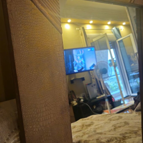 Wooden mirror used with leather decorative details, 51x76 cm