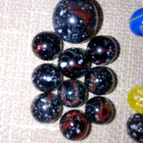Set of 68 glass marbles used with collectible designs and 2 large shooters