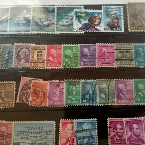 Stamp album with some stamps, mostly cancelled