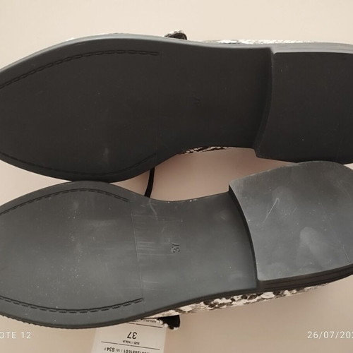 Calliope black and white moccasins new with tag