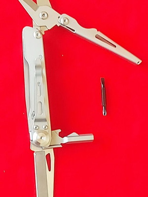Multitool new with large scissors, knife, and double-tip screwdriver