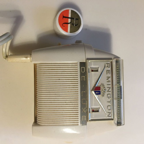 Vintage Remington shaver and massage device used