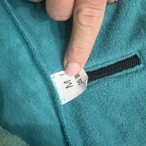 Waterproof dog jacket like new with fleece lining in petrol color