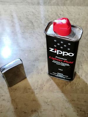 Zippo metal lighter with genuine lighter fluid 125ml used