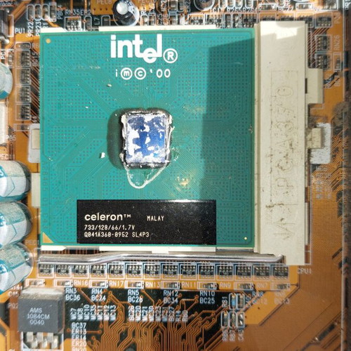 Vindage motherboard with Celeron processor and 3 memories