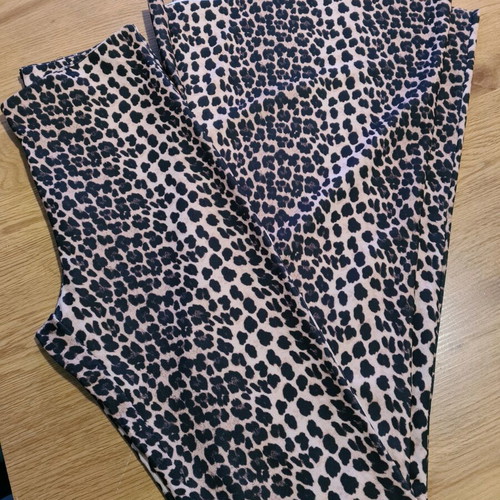 Leopard bell-bottom pants like new, size S