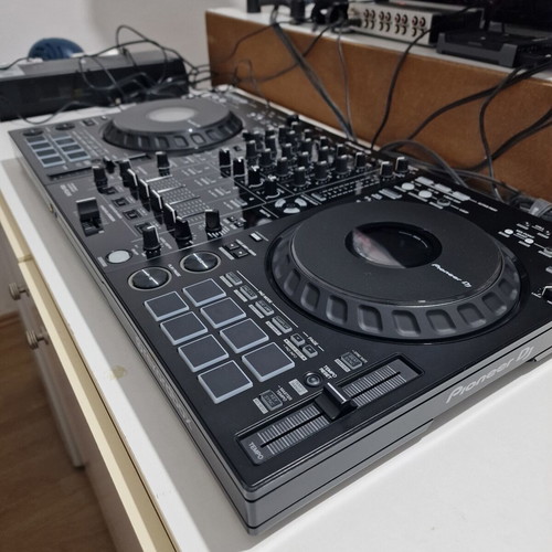 Pioneer DDJ-FLX10 DJ controller used with soft case and music collection