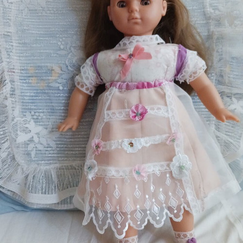 Vintage doll with unique handmade clothes like new