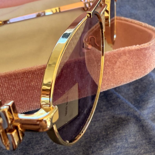 Miu Miu SMU 54ZS ZVN-70D sunglasses like new, gold frame, pink lenses