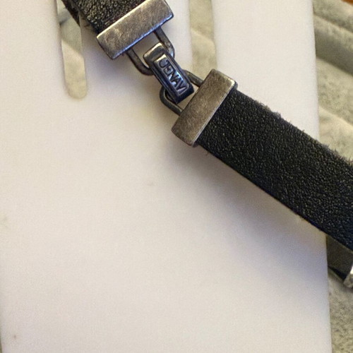 Leather bracelet with silver bow Jenavi new, black and silver
