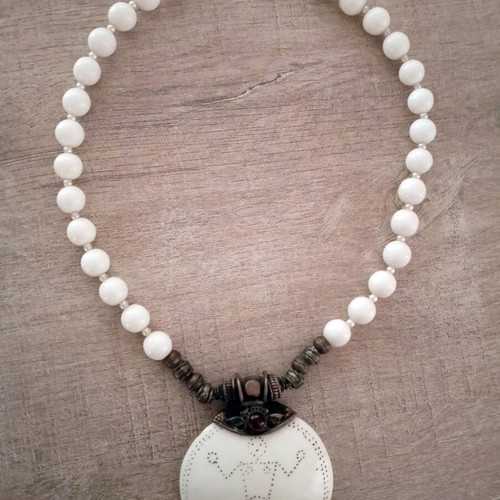 Handmade necklace with white pearls and bone charm used