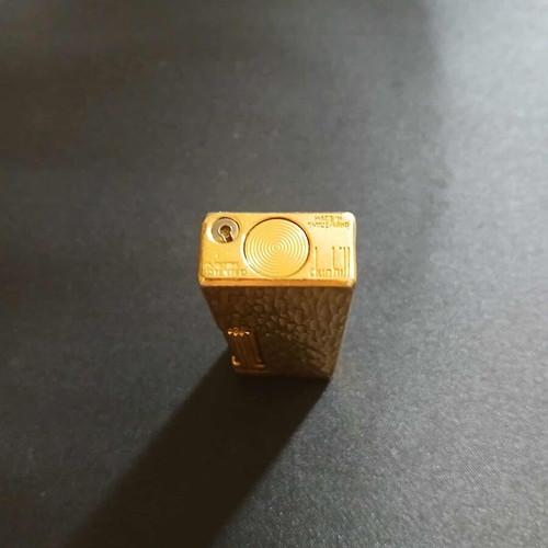 Dunhill Rollagas lighter used with goldplated finish and embossed design