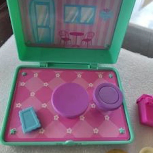 Polly Pocket house and suitcase used