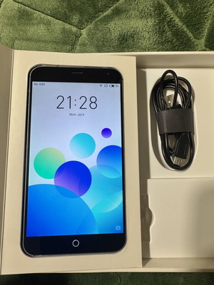 Meizu MX4 smartphone used with broken speaker for parts or repair
