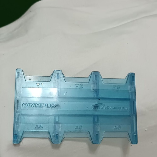 Olympus memory card case like new, transparent blue for 6 cards